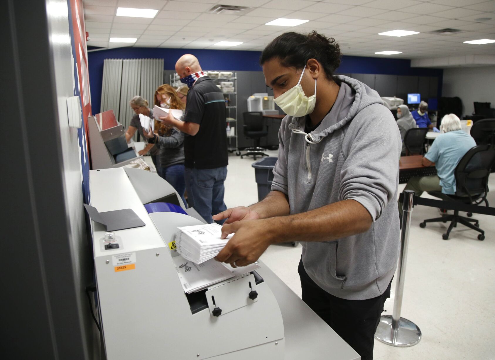 Methodical process ensures accurate count of absentee ballots, local election officials say